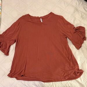 Elegant Rust Blouse with Ruffle Sleeves